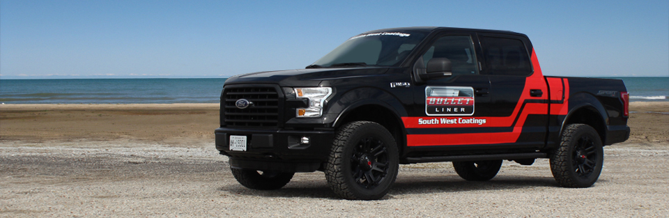 South West Coatings - Company Vehicle with Logo and Graphics on a Beach